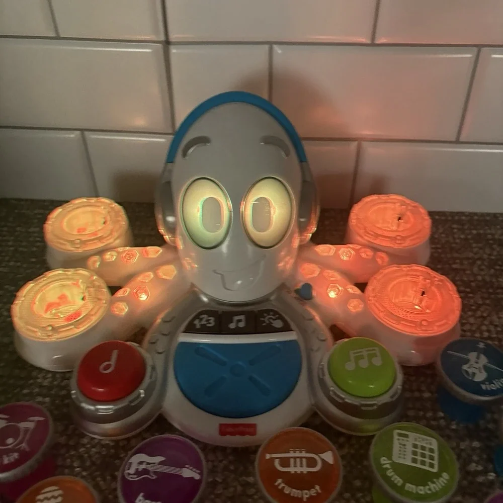 Fisher Price Rocktopus Octopus Think and Learn Educational Musical Toy